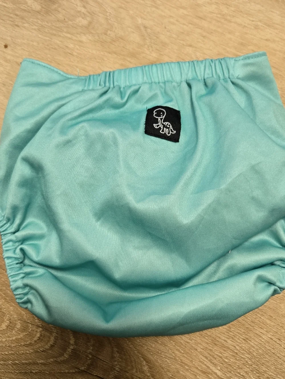 Dino diapers one size pocket diaper seafoam green color